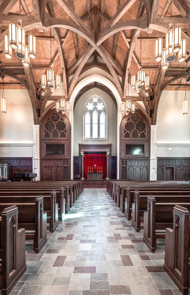 View of nave, altar and ceiling rafters