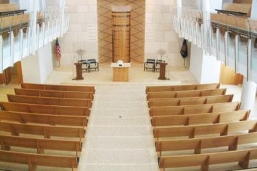 arial view of church with maple curved pews