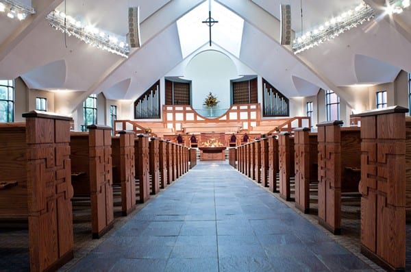 main walkway to front of church with pew ends