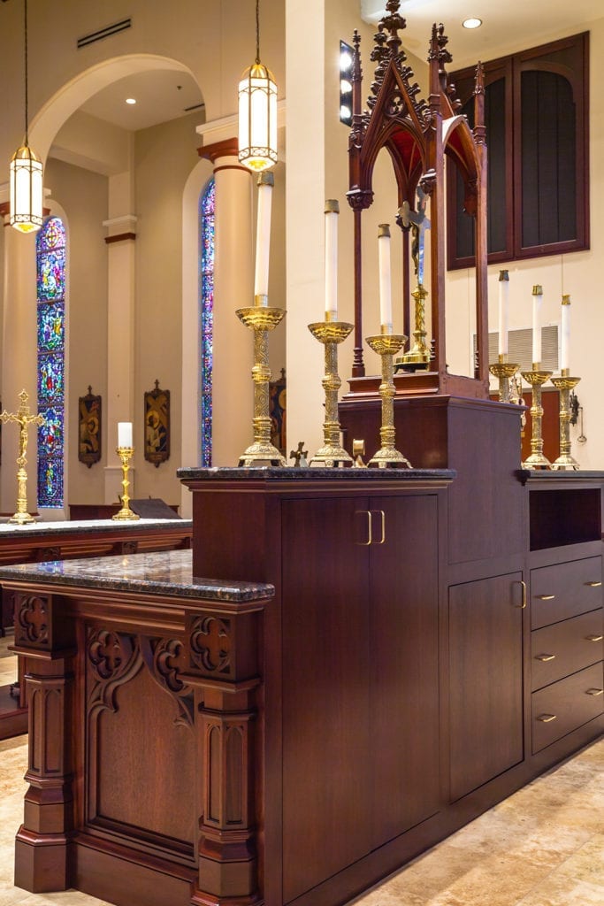 Detail of back of decorative wooden altar with marble top