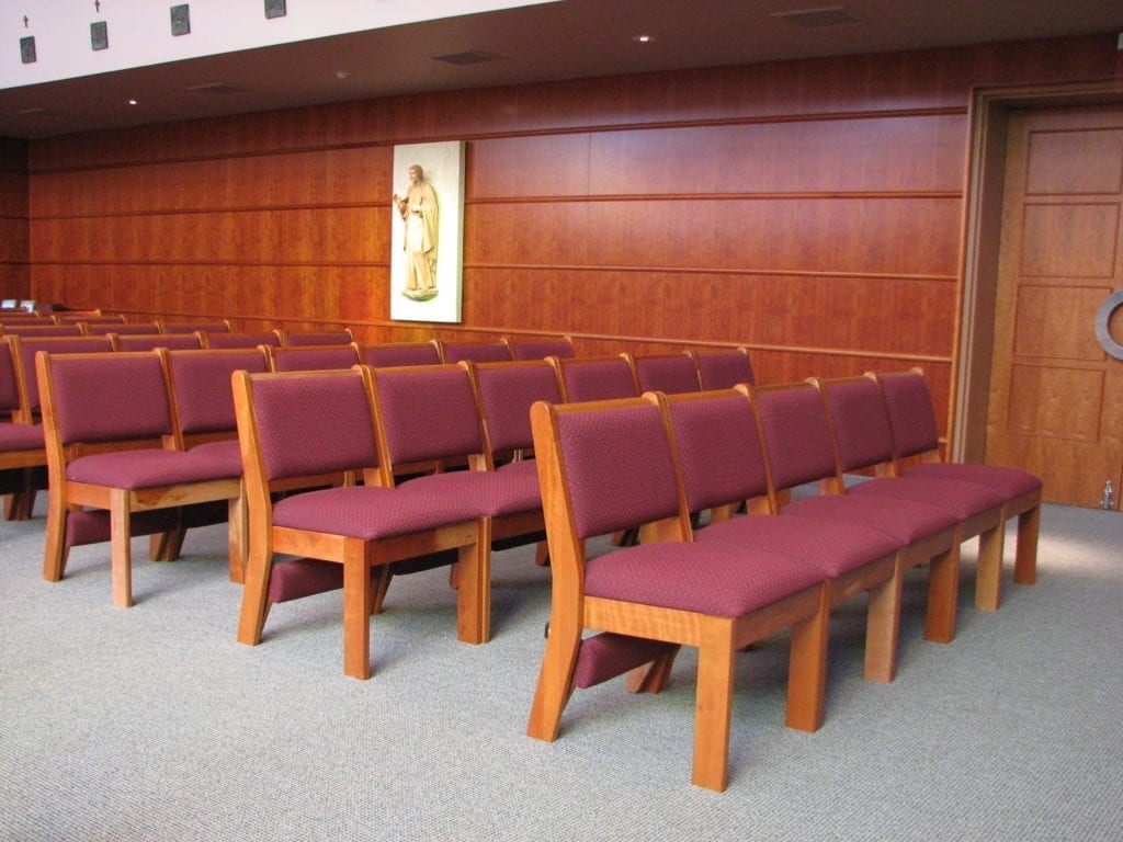 rows of stackable chairs