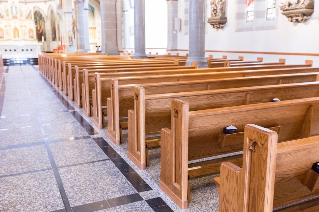 walkway with church pew ends