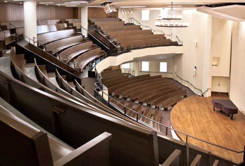 Custom radius curved pews installed in Redeemer Presbyterian Church