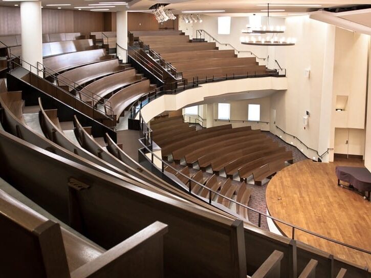 Custom radius curved pews installed in Redeemer Presbyterian Church