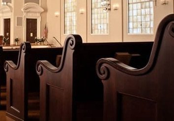 side view of wooden church pews