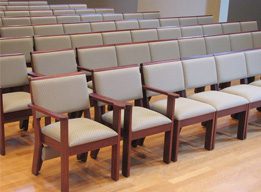 rows of solid wood church chairs